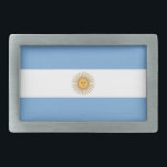 Gürtelschnalle mit Flagge Argentiniens<br><div class="desc">Fügen Sie Ihrem Kleiderschrank eine Touch Argentiniens Stolz mit unserem exklusiven Gürtelschnalle mit argentinischer Flagge hinzu! Dieser Gürtelschnalle, der mit viel Liebe zum Detail gestaltet wurde, ist mehr als nur ein funktionales Accessoire; er ist eine Feier des argentinischen Erbes und des kulturellen Stolzes. Das elegante Design zeigt deutlich die ikonische...</div>