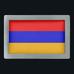 Gürtelschnalle mit Flagge Armeniens<br><div class="desc">Fügen Sie Ihrem Kleiderschrank eine Touch armenischen Stolzes mit unserem exklusiven Gürtelschnalle mit armenischer Flagge hinzu! Dieser Gürtelschnalle, der mit viel Liebe zum Detail gestaltet wurde, ist mehr als nur ein funktionales Accessoire; er ist eine Feier des armenischen Erbes und des kulturellen Stolzes. Das kühne Design zeigt die ikonische armenische...</div>