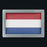 Gürtelschnalle mit Flagge der Niederlande<br><div class="desc">Steigern Sie Ihren Stil mit unserem markanten Gürtelschnalle mit der Flagge der Niederlande! Mit viel Liebe zum Detail gestaltet, präsentiert dieser Gürtelschnalle stolz die ikonische Dreisfarbenflagge der Niederlande. Die Fahne besteht aus drei horizontalen Bändern gleicher Größe - oben rot, in der Mitte weiß und unten blau. Diese Farbtöne sind ein...</div>