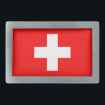 Gürtelschnalle mit Flagge der Schweiz<br><div class="desc">Fügen Sie Ihrem Kleid eine Touch Schweizer Stolzes mit diesem stilvollen Schnürchen mit der Schweizer Flagge hinzu! Dieser Schnabel, der mit viel Liebe zum Detail gestaltet wurde, ist mehr als nur ein Accessoire; er ist eine Feier des Schweizer Erbes und des Nationalstolzes. Das Design zeigt stolz die ikonische Fahne der...</div>