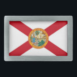 Gürtelschnalle mit Flagge des Florida-Staat<br><div class="desc">Feiern Sie den Sunshine Staat mit diesem stilvollen Gurtband unter Florida! Dieser Gürtelschnalle, der aus langlebigen Materialien gefertigt wurde, zeigt die ikonischen Elemente der Florida-Staatsflagge, darunter das Set des Staat-Siegels auf einem weißen Hintergrund. Dieser Gürtelschnalle ist sowohl funktional als auch modisch und eignet sich hervorragend, um Ihrem Outfit eine Touch...</div>