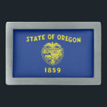 Gürtelschnalle mit Flagge des Oregon-Staat<br><div class="desc">Erleben Sie Ihr Accessoires-Spiel mit einem kühnen Statement-Stück: Unser Gürtelschnalle mit der Flagge von Oregon! Diese auffällige Gurtschnalle ist mehr als nur ein funktionales Element, sie ist eine stilvolle Hommage an Oregons Erbe und eine unverwechselbare Art, Ihren Staatsstolz zu zeigen. Das Design zeigt die ikonische Oregon-Staatsflagge und ist damit eine...</div>