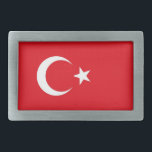 Gürtelschnalle mit türkischer Flagge<br><div class="desc">Fügen Sie Ihrer Accessoires-Kollektion eine Touch türkischen Stolzes mit unserem exklusiven Gürtelschnalle mit türkischer Flagge hinzu! Dieser Gürtelschnalle, der mit viel Liebe zum Detail gestaltet wurde, ist mehr als nur ein funktionaler Gegenstand, er ist ein Fest des reichen Kulturerbes und der kulturellen Identität der Türkei. Das auffallende Design zeigt deutlich...</div>