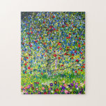 Gustav Klimt Apple Tree Puzzle<br><div class="desc">Puzzle mit Gustav Klimts Gemälde Apple Tree, I (1912). Ein bunter Apfelbaum steht in einem grünen Feld mit lila, rosa, gelben und weißen Blume. Ein perfektes Geschenk für Fans des Jugendstils und österreichischer Kunst.</div>