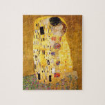 Gustav Klimt Das klassische Kiss-Gemälde Puzzle<br><div class="desc">Gustav Klimt Der Kuss Gustav Klimt verwendete in seinem wunderschönen Werk Jugendstil-Frauen und Dekorationskunst echtes Gold. Dieses Klimt-Gemälde hieß "Der Kuss" und ist das bekannteste Jugendstil-Werk, das er je gemalt hat. Das Gemälde Gustav Klimt ist eine Jugendstil-Frau und Mann in einer Umarmung. Die Farben sind überwiegend gold - mit echtem...</div>
