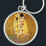 Gustav Klimt Das klassische Kiss-Gemälde Schlüsselanhänger<br><div class="desc">Gustav Klimt Der Kuss Gustav Klimt verwendete in seinem wunderschönen Werk Jugendstil-Frauen und Dekorationskunst echtes Gold. Dieses Klimt-Gemälde hieß "Der Kuss" und ist das bekannteste Jugendstil-Werk, das er je gemalt hat. Das Gemälde Gustav Klimt ist eine Jugendstil-Frau und Mann in einer Umarmung. Die Farben sind überwiegend gold - mit echtem...</div>