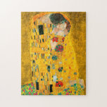 Gustav Klimt Der Kiss Puzzle<br><div class="desc">Puzzle mit Gustav Klimts Ölgemälde mit Goldblatt Der Kuss (1908). Ein Mann und eine Frau, die leuchtende goldene Farben tragen, sich liebevoll umarmen und in einem Feld von Blume küssen. Ein großartiges Geschenk für Jugendliche und österreichische Kunstliebhaber.</div>