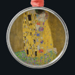 Gustav Klimt "Der Kuss" Silbernes Ornament<br><div class="desc">Gustav Klimts Meisterwerk: "Der Kuss". "Der Kuss", erstellt vom österreichischen Maler Gustav Klimt. Es gilt als sein berühmtestes Werk. Er malte es zwischen den Jahren 1907 und 1908, die den Höhepunkt seiner "Goldenen Periode" bildeten, als er eine Reihe von Werken malte, die Blattgold verwendeten. Österreich betrachtet "The Kiss" als nationalen...</div>