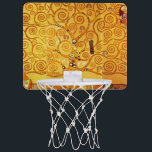 Gustav Klimt Tree of Life: Jugendstil-Symbolist Mini Basketball Netz<br><div class="desc">Mit diesem Meisterwerk, dem "Baum des Lebens" von Gustav Klimt (aus der Stilfrize), können Sie Ihren Platz stärken. Dieses gefeierte Jugendstil-Kunstwerk besticht durch seine schwindelerregenden, goldenen Äste, komplizierten Muster und symbolischen Motive, die die Reise, Verbindung und Wachstum des Lebens darstellen. Klimts prächtige, goldene, mosaikähnliche Details und abstrakte Formen schaffen ein...</div>