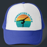Gymnastik ist das Leben Schönes Sunset Gymnastik A Truckerkappe<br><div class="desc">Gymnastik ist Leben. Niedliches Sonnenuntergang-Gymnastikgeschenk mit einem schönen bunten Hintergrund hinter einer Frau,  die einen hübschen Handstand mit den Splint macht.</div>