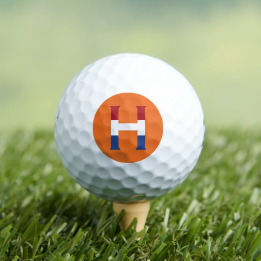 H Monogramm überlagert auf NLD-Flagge auf oder be6 Golfball (Insitu T-Shirt)