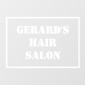 Haarsalonname auf einer Fensterklammer Fensteraufkleber (Blatt)