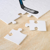 Hai beim Eishockey mit Eishockeystick Puzzle (Seite)