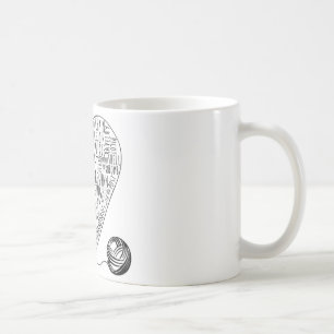 Häkelarbeit fasst Tasse ab