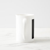 Halb Schwarzes und halbweiße Mitte fertigen dieses Porzellantasse (Rückseite)