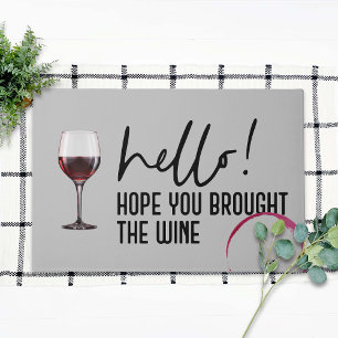 Hallo, hoffentlich hast du Wein mitgebracht, süß u Fußmatte