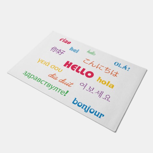 Hallo in vielen Sprachen farbiges Weiß Fußmatte (Schrägansicht)