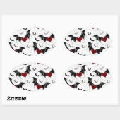 Halloween-Herz mit schwarzen Fledermausflügeln Ovaler Aufkleber (Blatt)