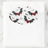 Halloween-Herz mit schwarzen Fledermausflügeln Ovaler Aufkleber (Tasche)