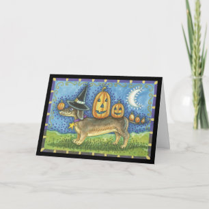 Halloween-Karte mit Hexenhund und Kürbisgewächsen Karte