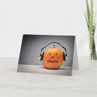 Halloween Kürbis mit Kopfhörern für Musik