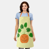 Halloween Monstera Pflanze in Pumpkin Schürze (Getragen)