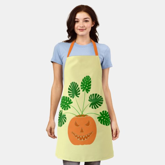 Halloween Monstera Pflanze in Pumpkin Schürze (Getragen)