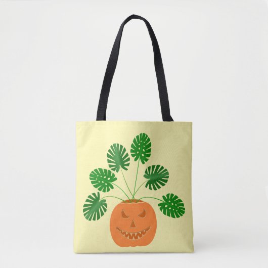 Halloween Monstera Pflanze in Pumpkin Tasche (Vorderseite)