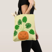 Halloween Monstera Pflanze in Pumpkin Tasche (Von Nahem)