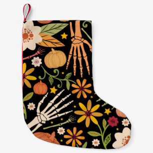 Halloween nahtloses Muster mit Knochen und Blumen  Kleiner Weihnachtsstrumpf