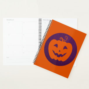 Halloween Orange Pumpkin im Lila Hintergrund Planer