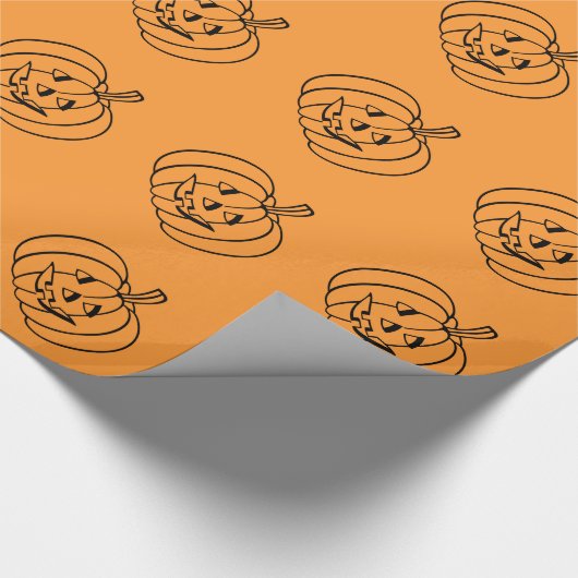 Halloween-Packpapier mit geschnitztem Kürbiskopf Geschenkpapier (Ecke)