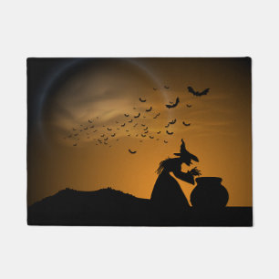 Halloweenhexe und -großer Kessel mit Schlägern Fußmatte
