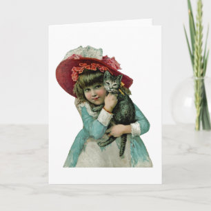 Halten eines Weihnachtskätzchens Feiertagskarte