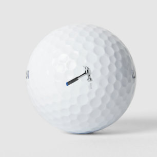 Hammerschlag auf einen Nagel Golfball