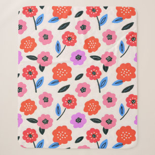 Han zeichnet Blumenmuster Sherpadecke