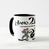 Hand2Hand Tasse (Vorderseite Links)
