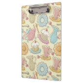 Hand, die Geschirr-Silhouetten zeichnet Klemmbrett (Links)