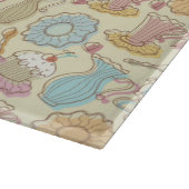 Hand, die Geschirr-Silhouetten zeichnet Schneidebrett (Ecke)