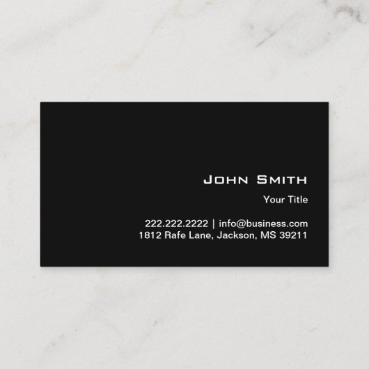 Hand Holding Light Bulb Dunkle Visitenkarte (Rückseite)