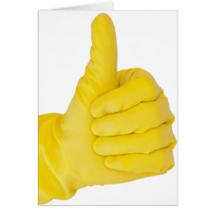 Hand in gelbem Latex Handschuh