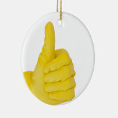 Hand in gelbem Latex Handschuh Keramikornament (Rechts)
