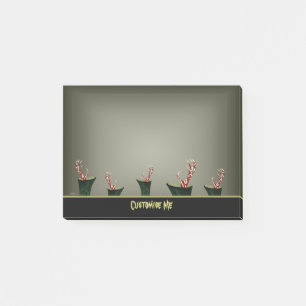 Hand von grimmigem post-it klebezettel