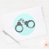 HANDCUFFS RUNDER AUFKLEBER (Umschlag)