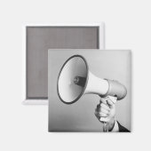 Hände halten magnet (Vorderseite/Rückseite)