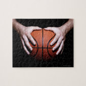 Hände mit einem Basketball Puzzle (Horizontal)