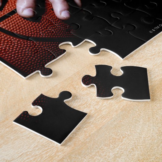 Hände mit einem Basketball Puzzle (Seite)