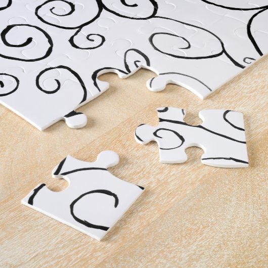 Handgemalte schwarze Krümmung auf Weiß Puzzle (Seite)
