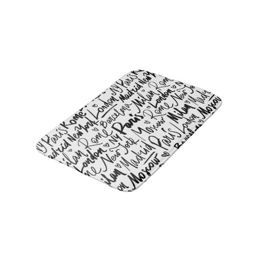 Handgeschriebene berühmte Städte des Weltmusters Badematte (Schrägansicht)