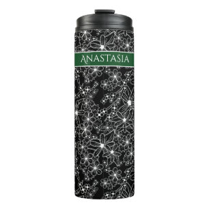 Handgezeichnetes Schwarz-weißes Muster und grüner Thermosbecher